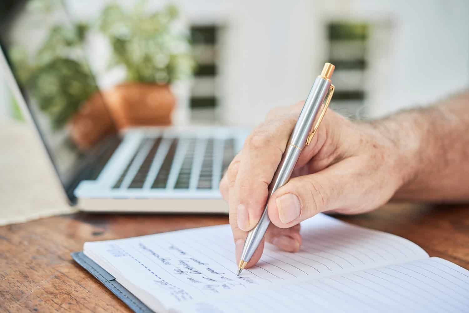 Senior Man Filling Diary 1098 21799