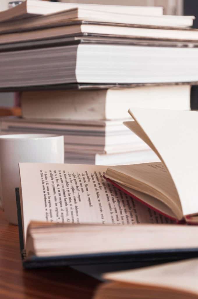 Various Books Near Mug 23 2147863477